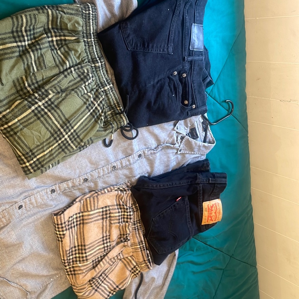 A bundle of Mens Clothes